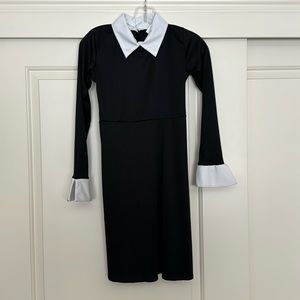 Wednesday Addams black long sleeve dress size 12-14 runs a little small.